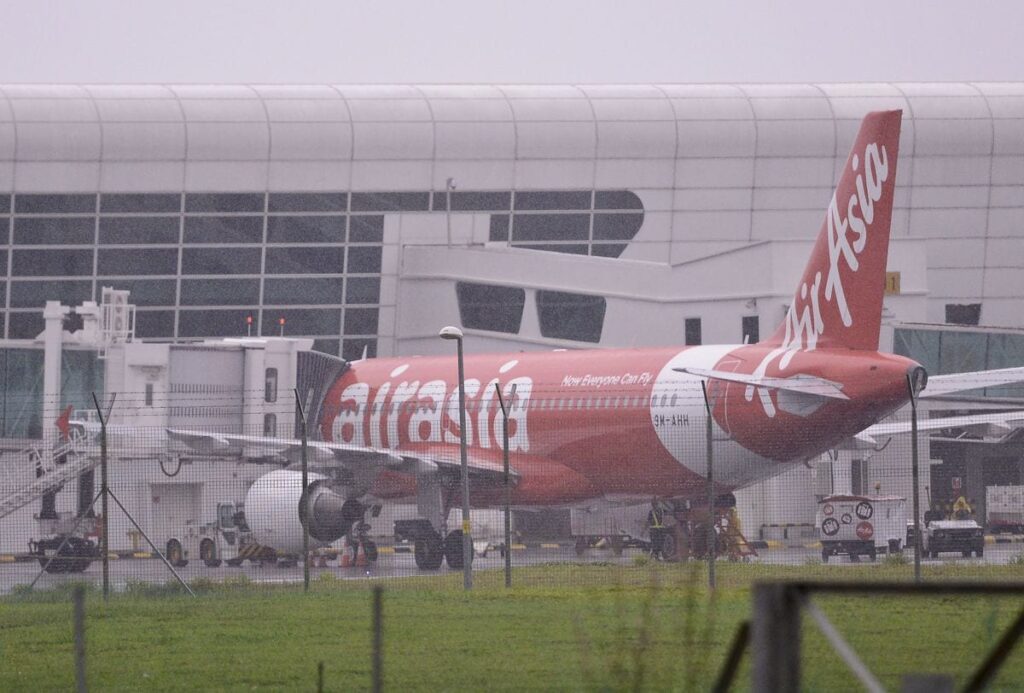 AIRASIA air asia plane airbus klia2 281214 TMI NAZIR