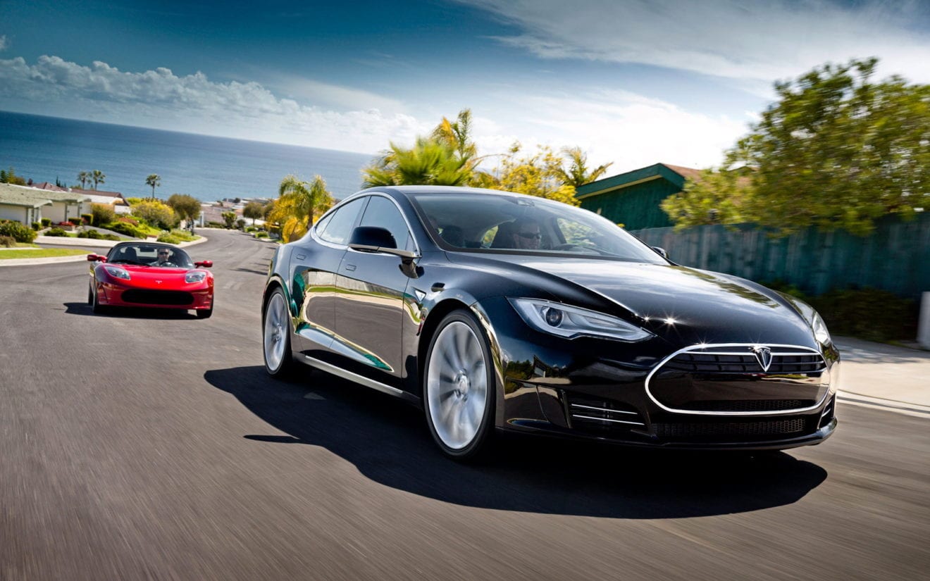 Tesla Shares Surge 13% As Strong Deliveries Drive Profit Optimism