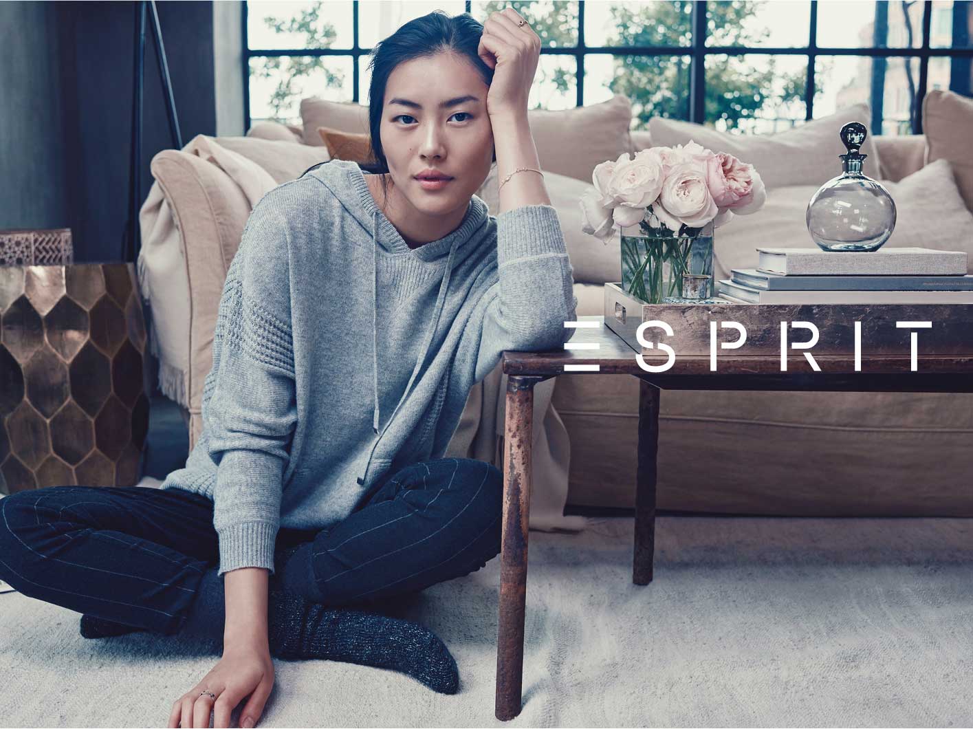 Clothing retailer Esprit reports first-half loss