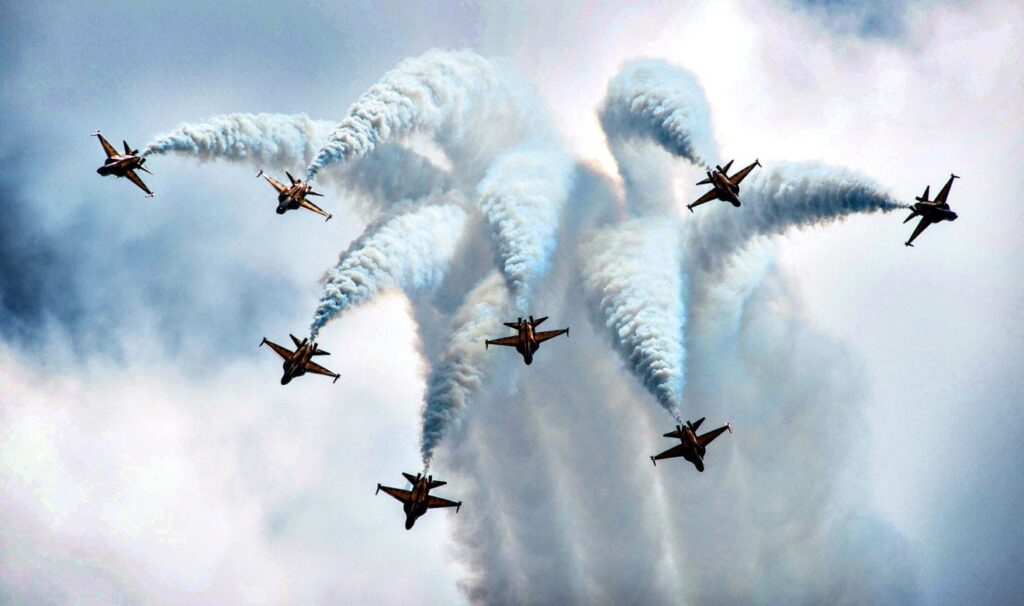 The Singapore Airshow...epa04068174 An aerial display of the Rep