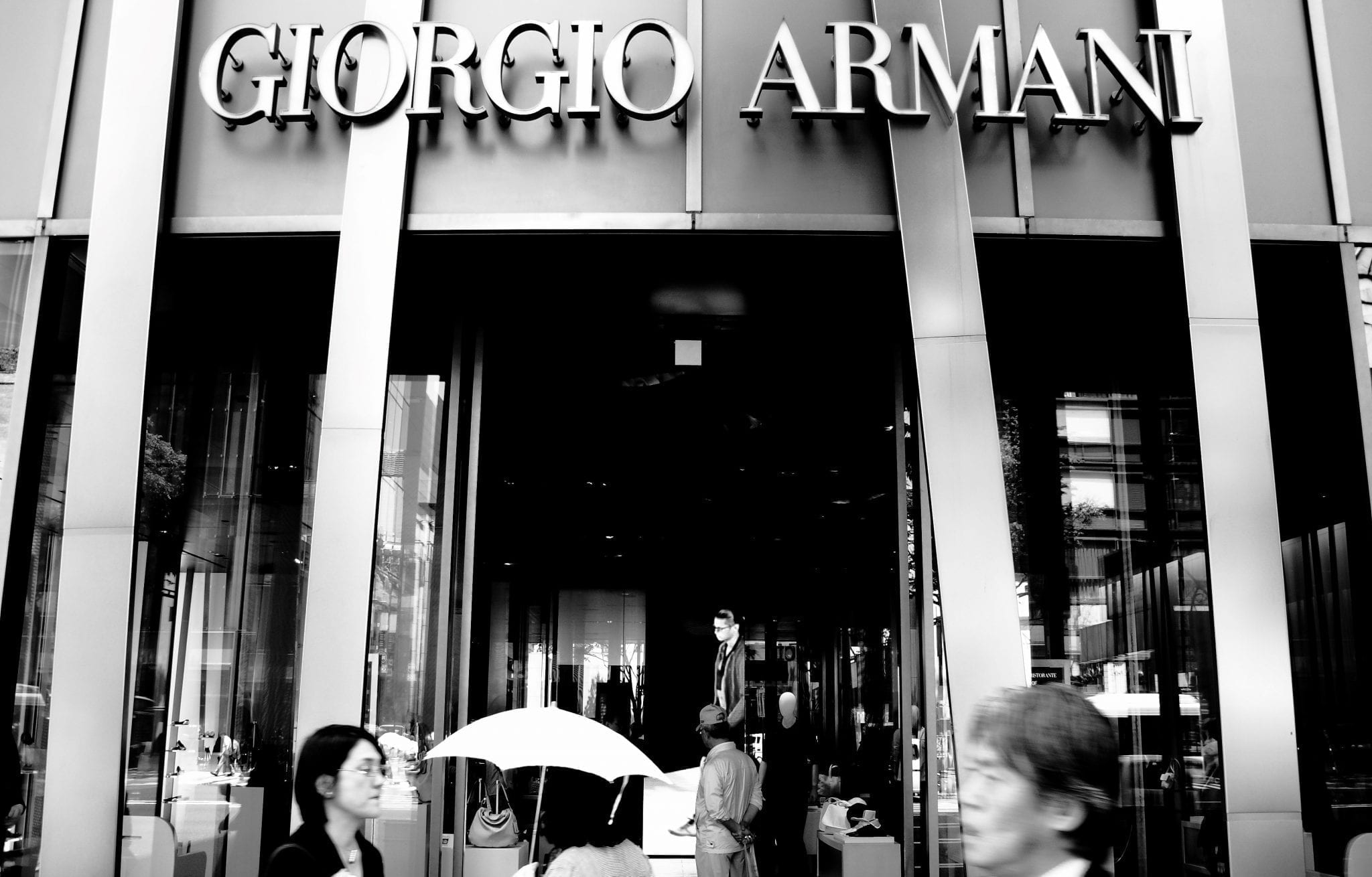 Giorgio Armani consolidating brands