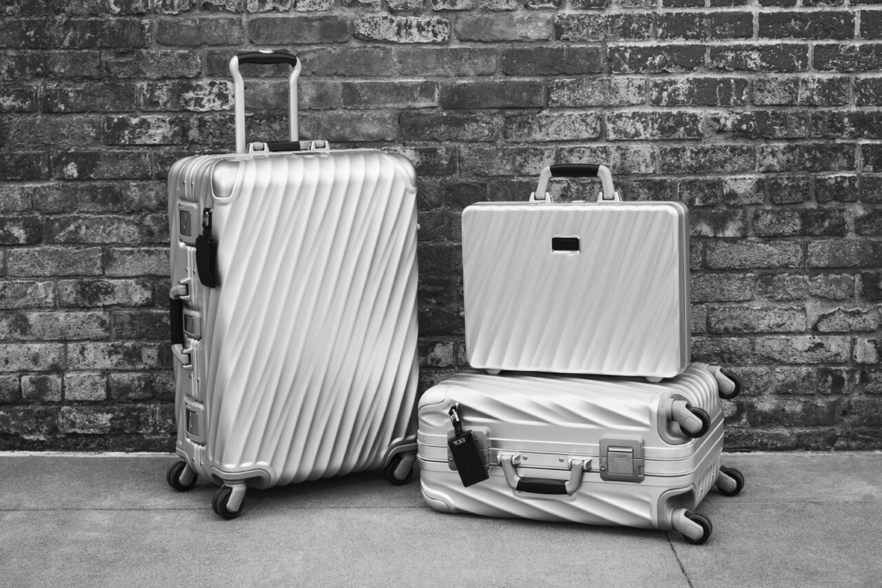 L to R  19 Degree Aluminum Short Trip Packing Case 19 Degree Aluminum International Carry On and 19 Degree Aluminum Briefcase in Silver Black White
